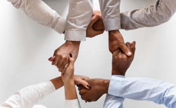 shareholders shaking hands